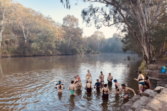 River enthusiasts taking a dip in Melbourne's Yarra/Birrarung River.