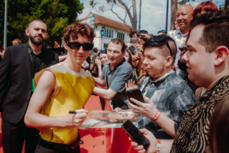 Troye Sivan signing autographs at last year's ARIA Awards.